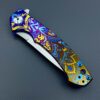 Zero Tolerance ZT 0450 Plain Edge Folder Fall Paisley Ano pattern zt450 w/blue titanium screws - Image 6
