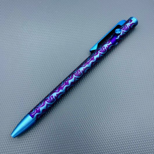 Tactile Turn - Titanium Slim Bolt Action Standard Size Pen Custom Sguigly Pattern Blue & Purple barrel w/color contrasted cap, screw, & bolt.