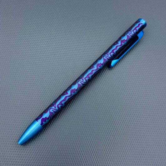 Tactile Turn - Titanium Slim Bolt Action Standard Size Pen Custom Sguigly Pattern Blue & Purple barrel w/color contrasted cap, screw, & bolt. - Image 2